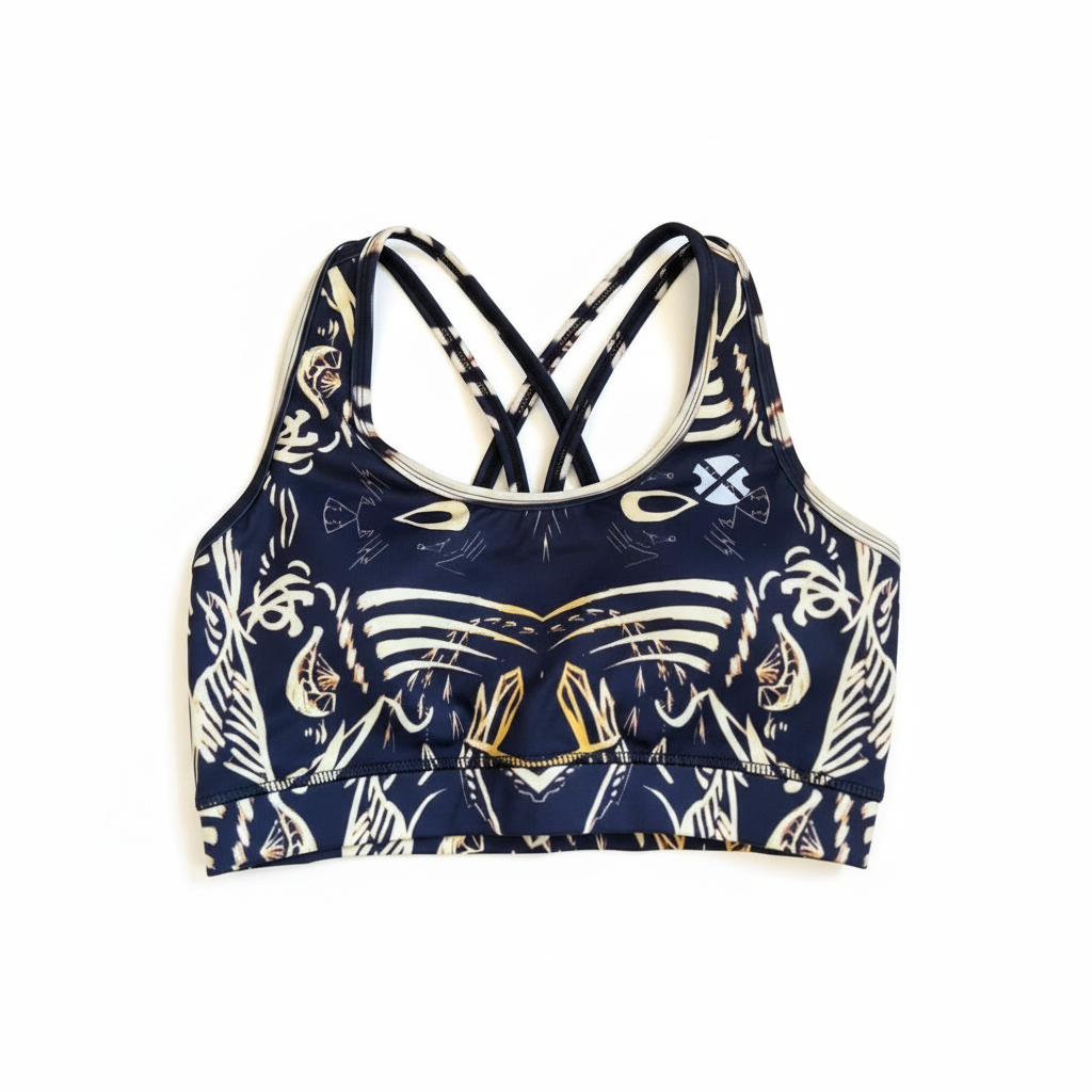 Navy blue sports bra with white abstract patterns on a white background